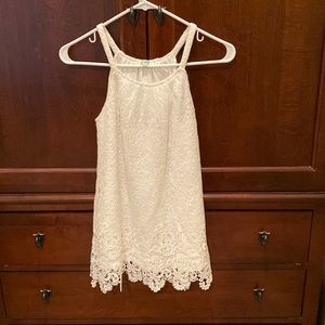 Dressy sleeveless top by Jade in creamy white.